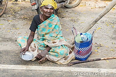 Portrait of an unidentified homeless woman in the street of the sacred city of Rameshwaram, India. Editorial Stock Photo