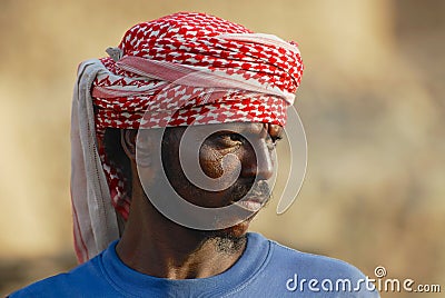 Portrait of unidentified man wearing traditional head scarf in Aden, Yemen. Editorial Stock Photo