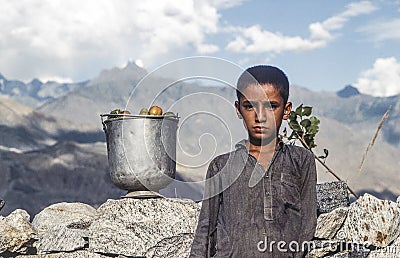 Portrait of unknown poor working boy Editorial Stock Photo