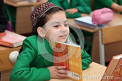 Portrait of an unknown schoolgirl in the classroom. Editorial Stock Photo