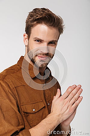 Portrait of unshaven young man posing and looking at camera Stock Photo