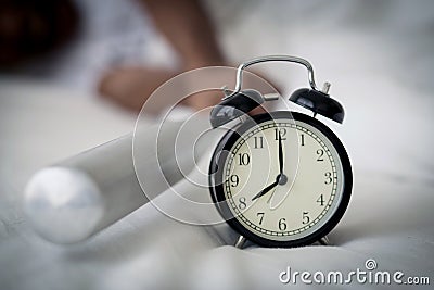 Portrait upset angry with baseball hit young man screaming at alarm clock. Stock Photo