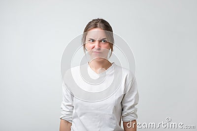 Portrait of an upset unsatisfied european woman. Stock Photo