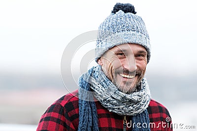 Portrait of urban very smiling guy. Happy Man in hat with ball and scarf. Funny man smiles to you. Closeup of big smile man face Stock Photo