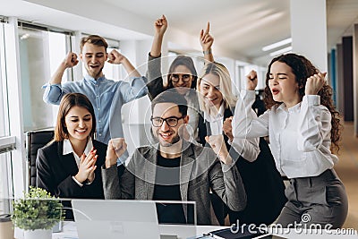 Portrait of very happy successful expressive gesturing business team at office Stock Photo