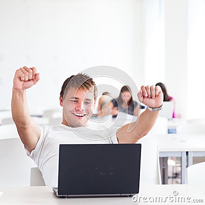 Portrait of a very happy young, male college student Stock Photo