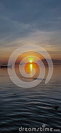 A portrait view of a low tide beach and nice to explore Stock Photo