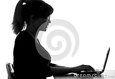 Portrait of a visually impaired woman working on laptop Stock Photo
