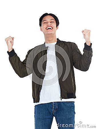 Portrait, winner and success celebration of man in studio isolated on white background. Winning, achievement and happy Stock Photo