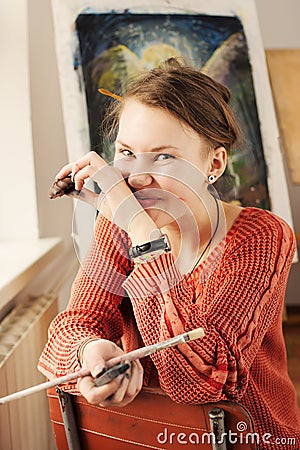 Portrait of woman artist with quirky expressions Stock Photo