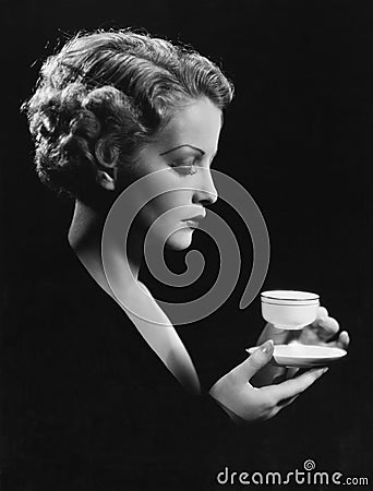 Portrait of woman with beverage Stock Photo