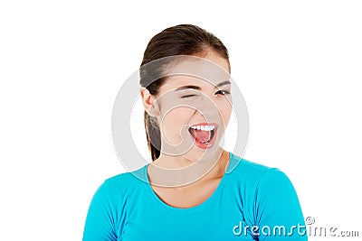 Portrait of a woman blinks her eye Stock Photo