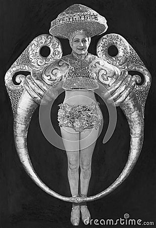 Portrait of woman in elaborate ring costume Stock Photo