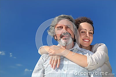 Portrait of woman embracing her father Stock Photo