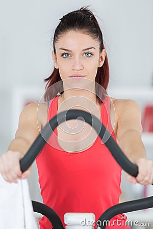portrait woman exercising on step machine Stock Photo