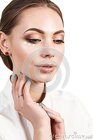 Portrait of woman face with cream dotts Stock Photo