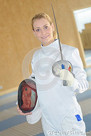 Portrait woman in fencing gear Stock Photo