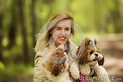 Portrait of a woman with her beautiful dogs Stock Photo
