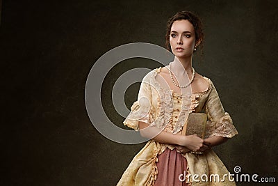 Portrait of woman in historical dress Stock Photo