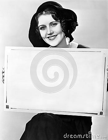 Portrait of woman holding sign in Hungarian Stock Photo