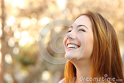 Portrait of a woman laughing with a perfect teeth Stock Photo
