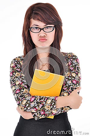 Portrait of woman scowling and hugged blank books, isolated on w Stock Photo