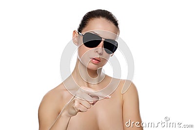 Portrait of woman in sunglasses shows the left. Stock Photo