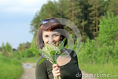 Portrait of woman among trees Stock Photo