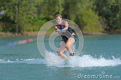 Portrait woman waterskiing Stock Photo