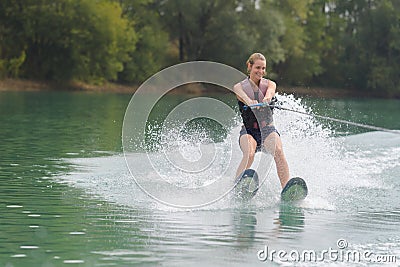 portrait woman waterskiing Stock Photo