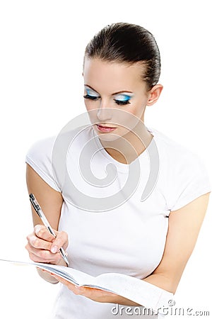 Portrait of woman writing something Stock Photo