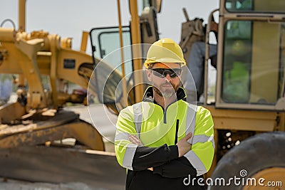 Portrait worker in construction helmet. Engineer builder foreman or repairman. Worker at building site. Construction Stock Photo
