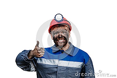 Portrait working young male coal miner in red cap showing thumbs up, excellent sign, isolated white background Stock Photo