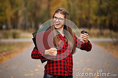 Portrait of young american university student smiling with takeaway coffee Stock Photo