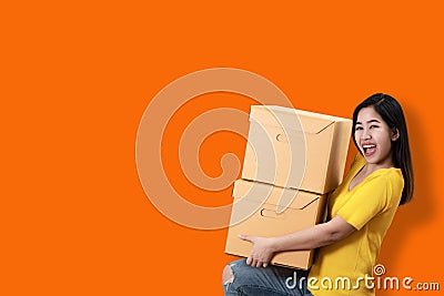 Portrait of young asian entrepreneur happy smiling and holding o Stock Photo