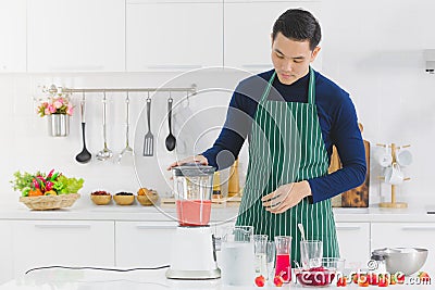 MAN IN APRON Stock Photo