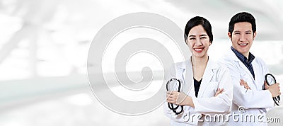 Portrait of young attractive asian doctor team or physician group crossed arm holding stethoscope medical equipment Stock Photo
