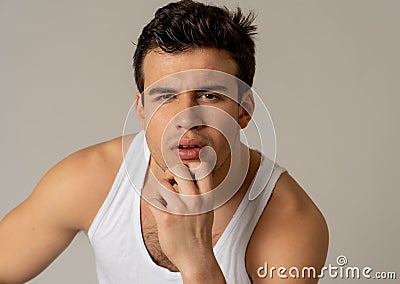 Fashion portrait of Attractive strong young man model posing happy and sexy for the camera Stock Photo