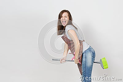 Portrait of young attractive smiling brunette caucasian housewife on white background. Beautiful housekeeper woman Stock Photo