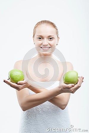 Portrait of young attractive woman holding two Stock Photo