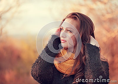 Portrait of an young attractive woman with long brown hair and b Stock Photo