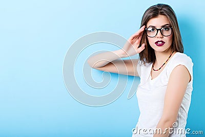 Portrait of a young beautiful confident woman in stylish glasses Stock Photo