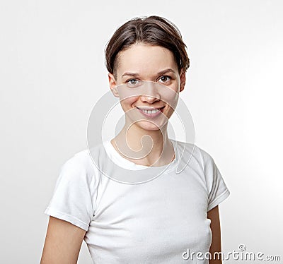 Portrait of young beautiful cute cheerful girl smiling looking at camera, isolated on white background Stock Photo