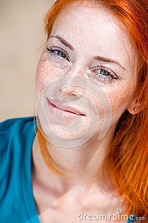 Portrait of a young beautiful freckled redhead woman Stock Photo