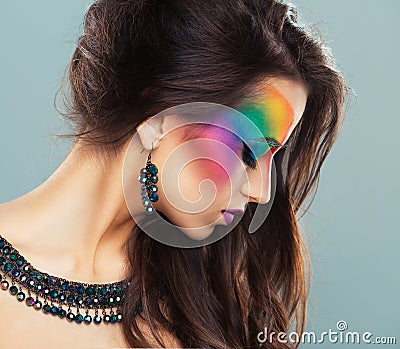 Portrait of a young beautiful girl with a fashion bright multicolored makeup Stock Photo