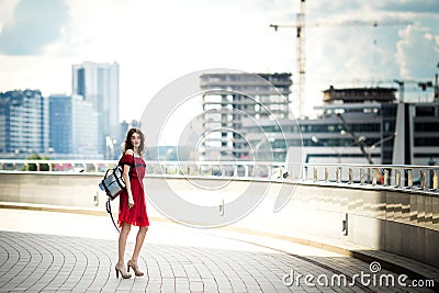 A portrait of a Young beautiful girl in a red dress Stock Photo