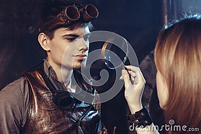 Portrait of a young beautiful loving couple in steampunk style. Stock Photo