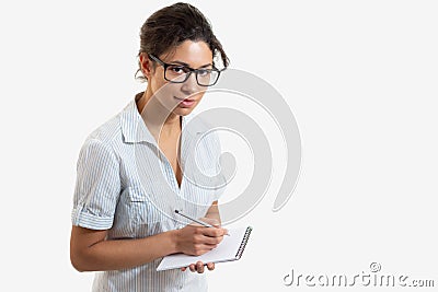 Portrait of a young beautiful woman with a pencil and notepad Stock Photo