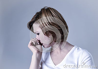 Portrait young beautiful woman on her 30s sad and depressed in breakdown suffering depression Stock Photo