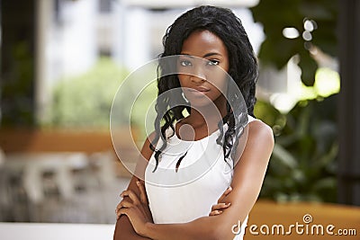 Portrait of young black businesswoman with arms crossed Stock Photo